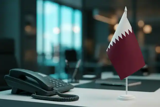 Qatari flag on an office desk